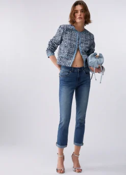 Jeans skinny con risvolto