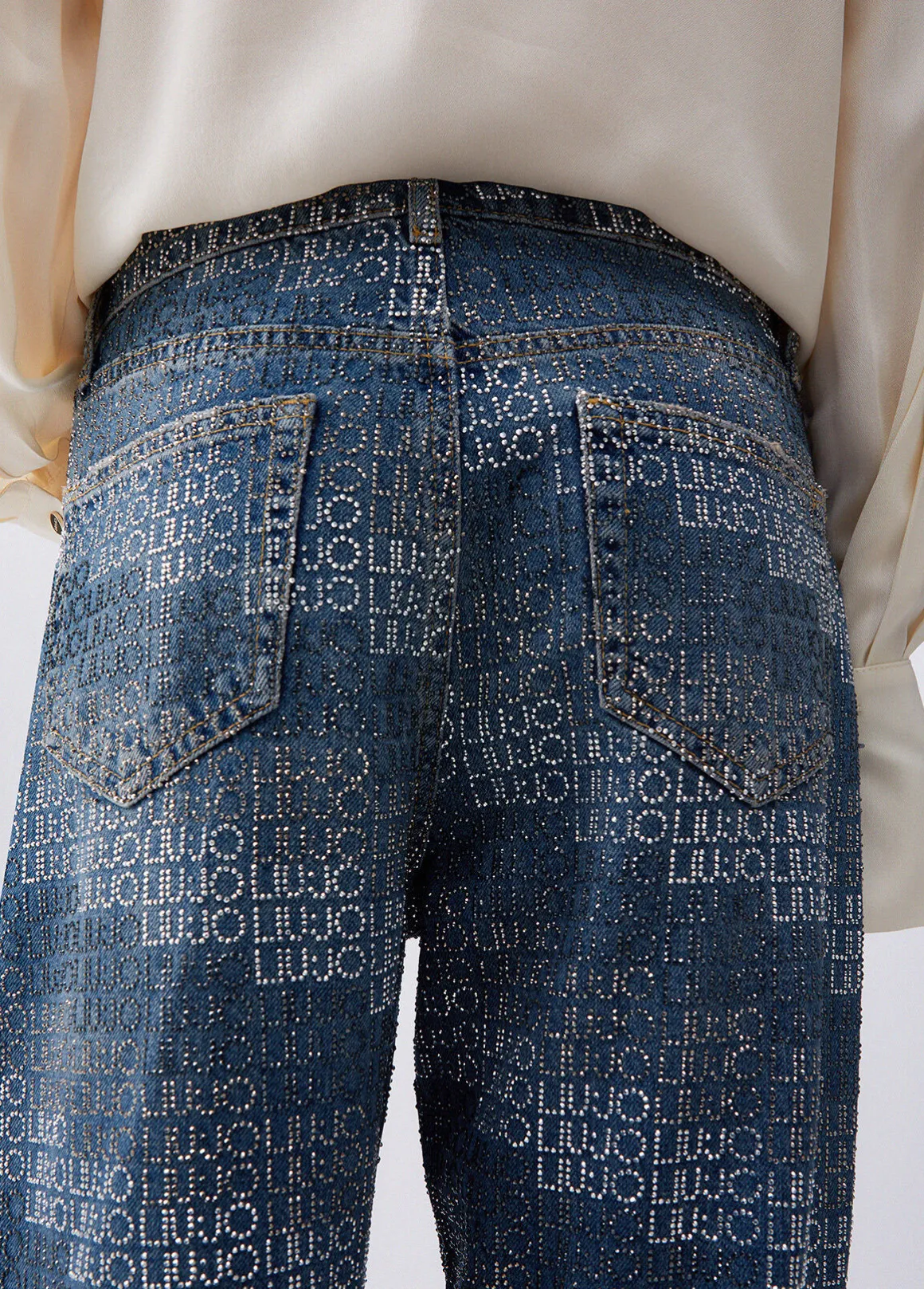 Jeans straight con strass
