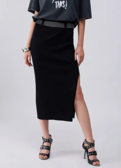 Longuette in maglia con borchie