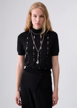 Lupetto con cut-out e perline