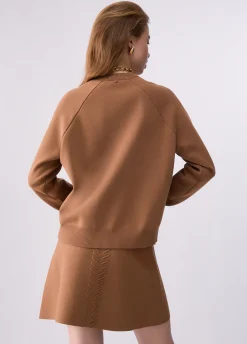 Maglia boxy con dettagli intrecciati