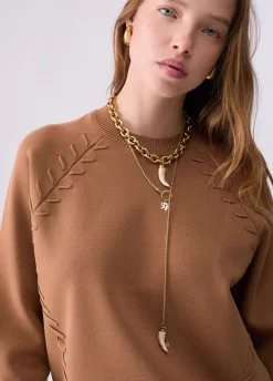 Maglia boxy con dettagli intrecciati