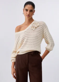 Maglia con ricamo traforata