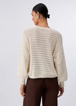 Maglia con ricamo traforata