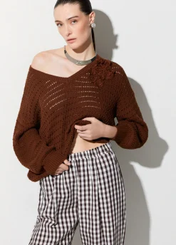 Maglia con ricamo traforata