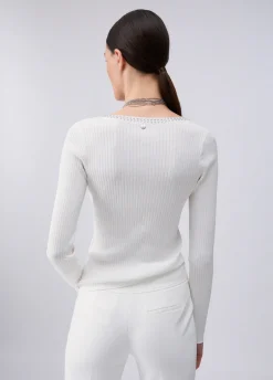 Maglia scollo a V con borchie