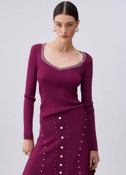 Maglia scollo a V con borchie