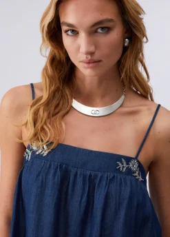 Mini abito in denim con castoni