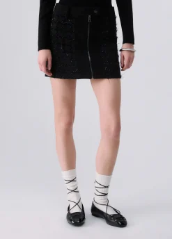 Minigonna in bouclé con zip
