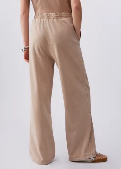Pantalone in jersey délavé con strass