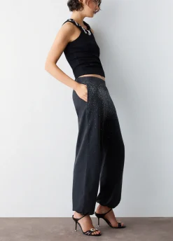Pantalone in jersey délavé con strass