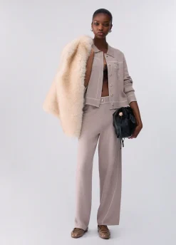 Pantaloni con cuciture a contrasto