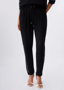 Pantaloni con strass