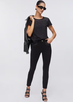 Pantaloni con strass