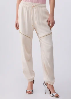 Pantaloni con zip