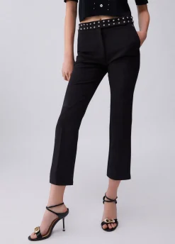 Pantaloni eleganti con borchie