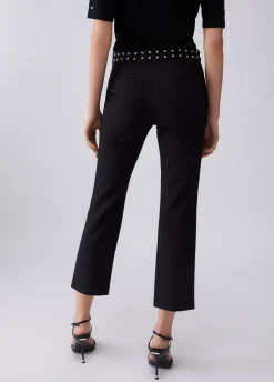 Pantaloni eleganti con borchie