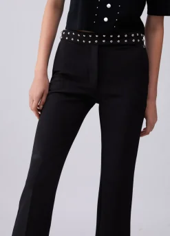 Pantaloni eleganti con borchie