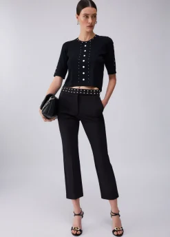 Pantaloni eleganti con borchie