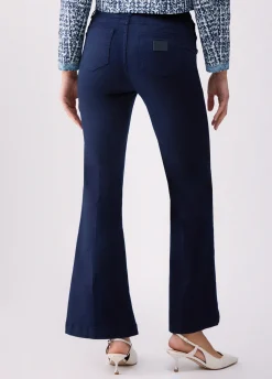 Pantaloni flare con bottoni logati