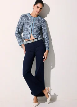 Pantaloni flare con bottoni logati