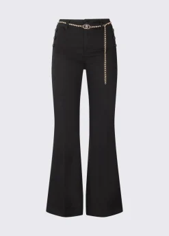 Pantaloni flare con bottoni logati