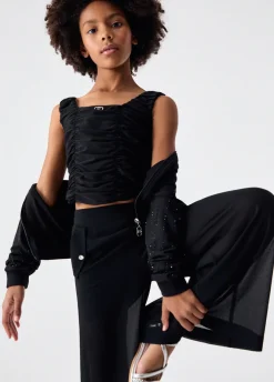 Pantaloni flare con bottoni logati