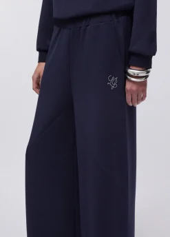 Pantaloni flare in scuba