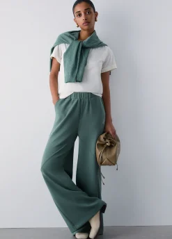 Pantaloni flare in scuba