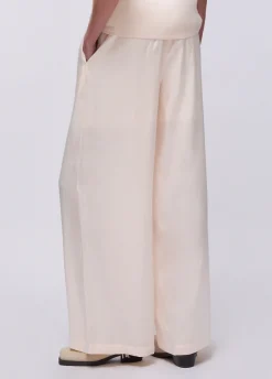 Pantaloni flare laminati