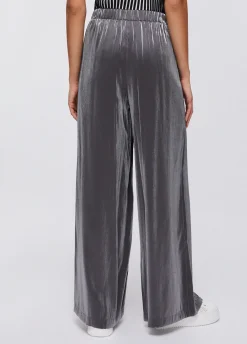 Pantaloni flare laminati