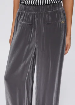 Pantaloni flare laminati