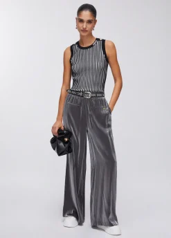 Pantaloni flare laminati