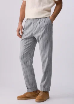 Pantaloni gessati con pence