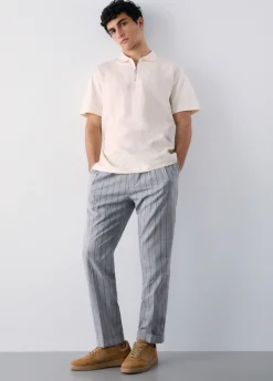 Pantaloni gessati con pence