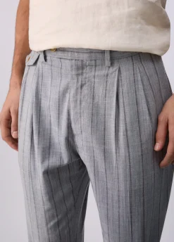Pantaloni gessati con pence