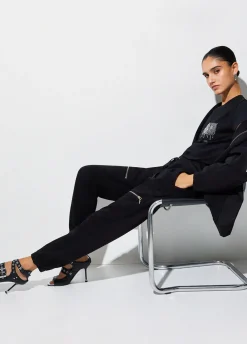 Pantaloni in felpa con zip