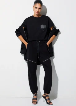 Pantaloni in felpa con zip