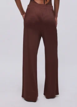 Pantaloni in jersey lucido