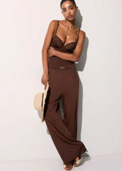 Pantaloni in jersey lucido