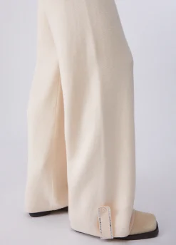 Pantaloni in maglia con perline
