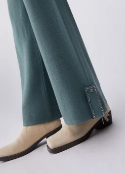 Pantaloni in maglia con perline