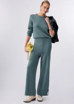 Pantaloni in maglia con perline
