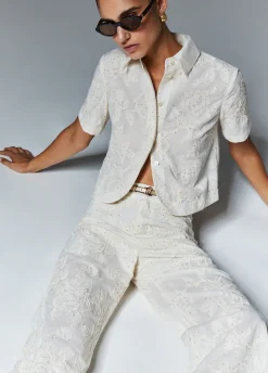 Pantaloni in mussola ricamati