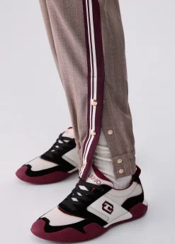 Pantaloni jogging con tape laterale