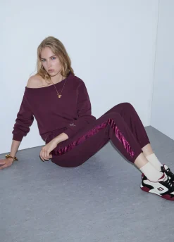 Pantaloni jogging con tape logato
