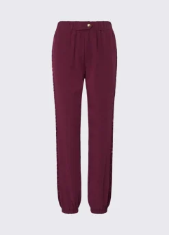 Pantaloni jogging con tape logato