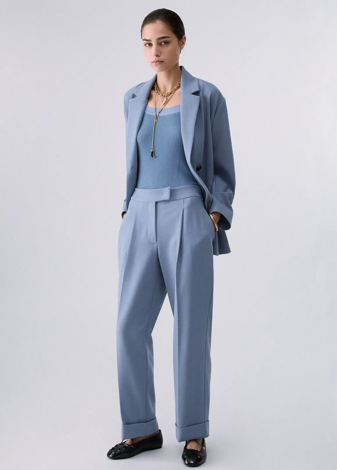 Pantaloni mélange con risvolto