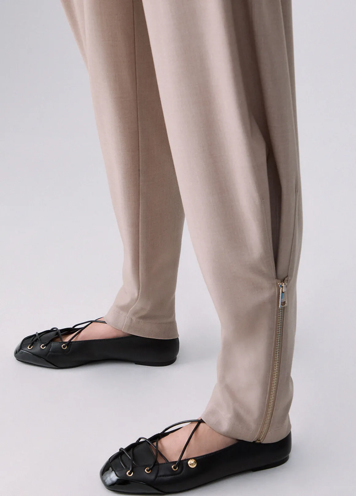 Pantaloni mélange con zip