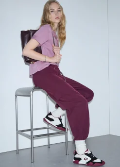 Pantaloni oversize con charm